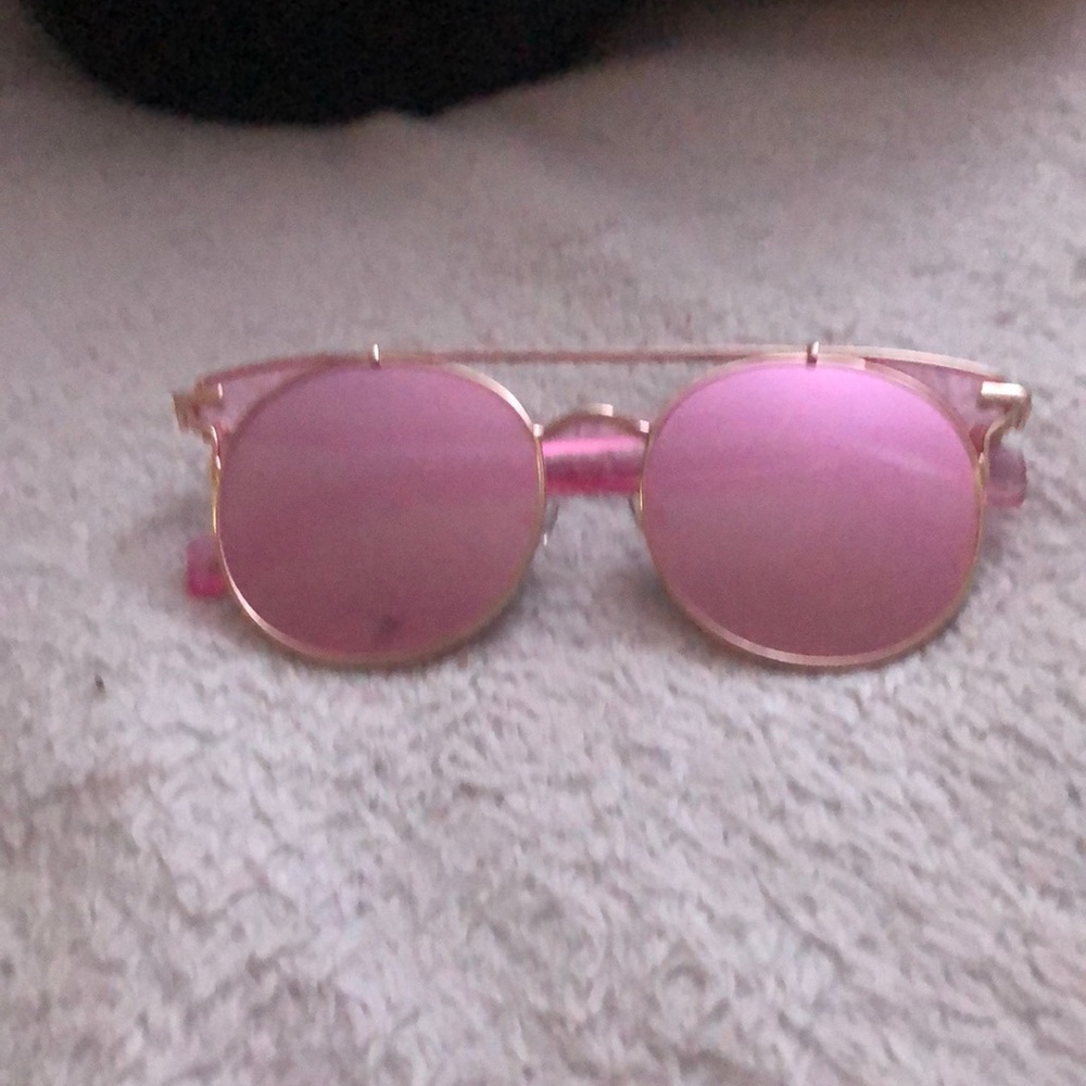 Pink sunglasses.